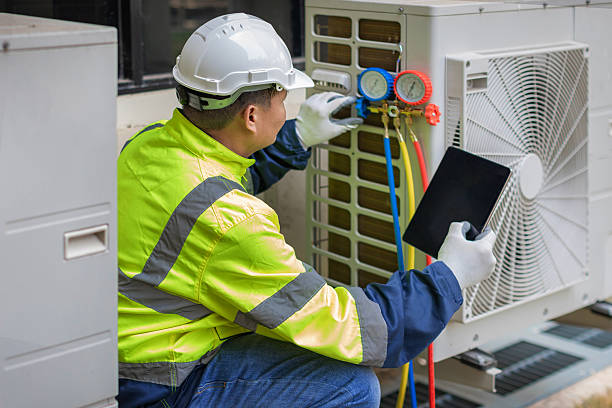 Professional Air Duct Cleaning technician working in Queens Village, NY